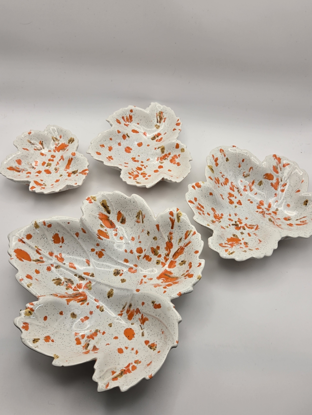 Handmade White Ceramic Leaf Bowls with Orange & Gold Splatter - Set of 4